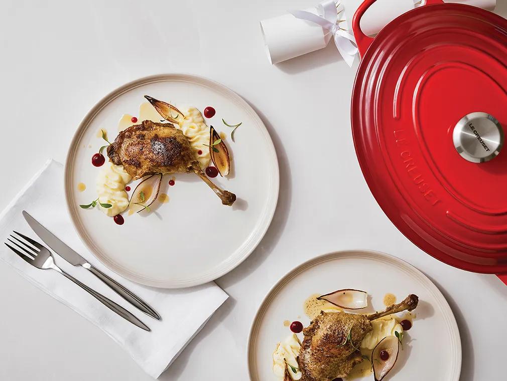 Confit de canard, purée de pommes de terre et échalotes grillées
